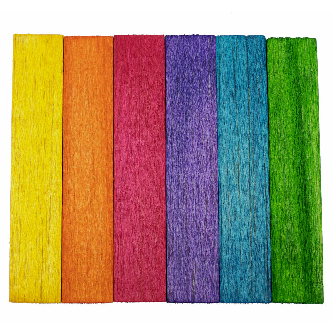 Set of colorful Balsa Nibblers in a row on a white background