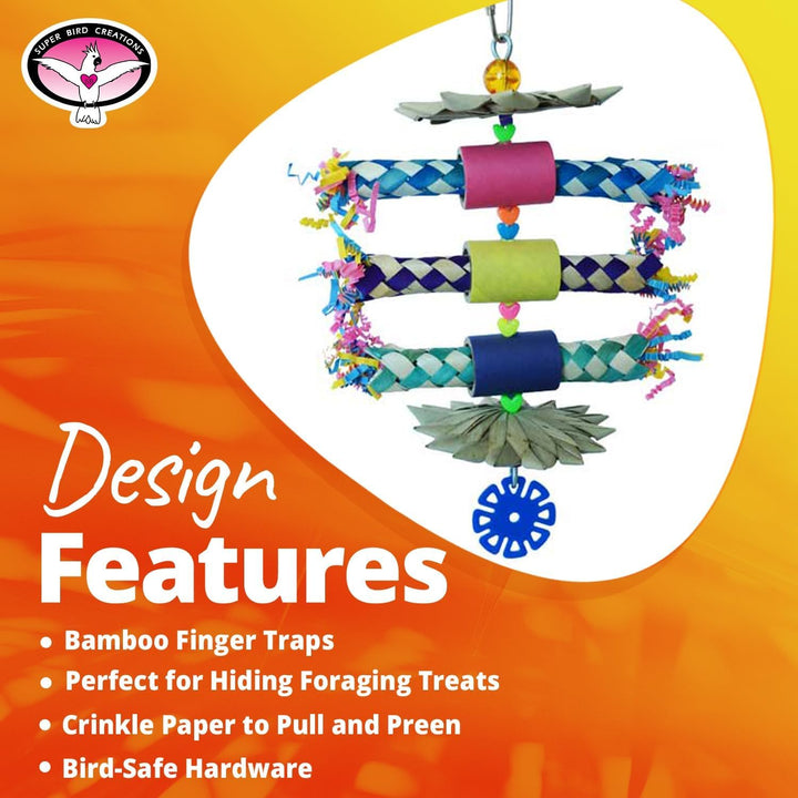 A colorful bird toy with braided blue and green ropes, pink and green cylindrical pieces, leaf-shaped wings, and a blue wheel hanging ornament