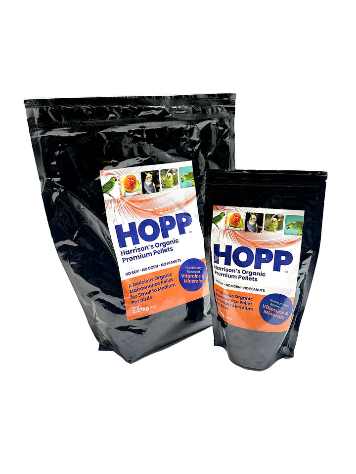 Two packages of HOPP brand pet food on a white background