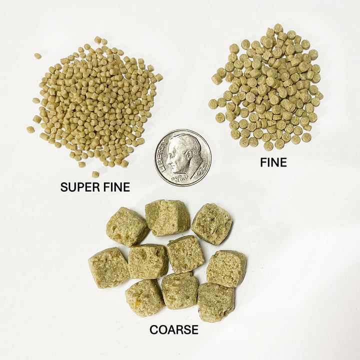 Three different textures of green pellets labeled 'Super Fine', 'Fine', and 'Coarse' with a coin for scale on a white background.