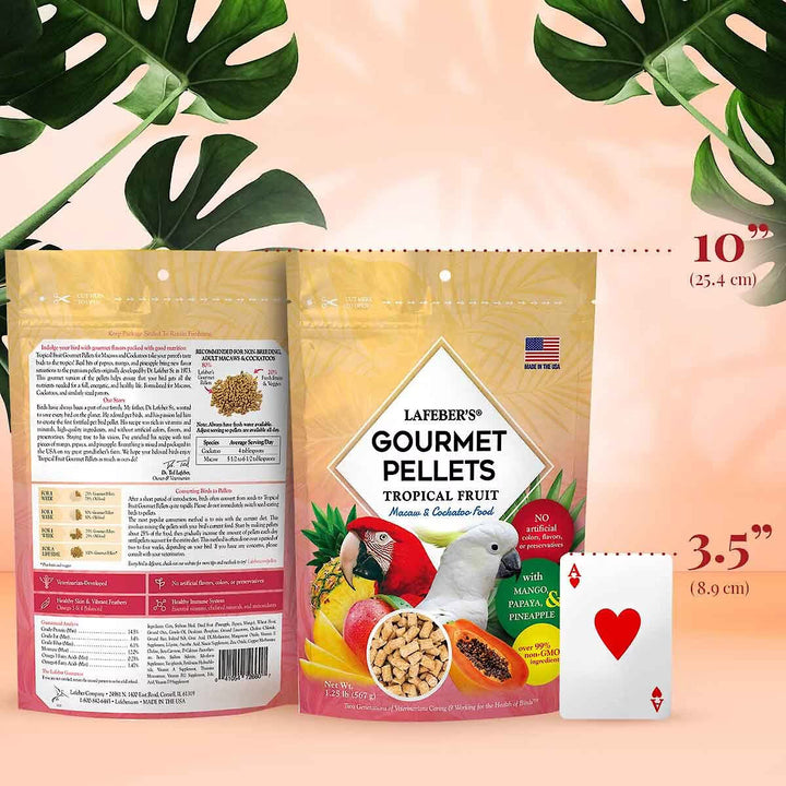Lafeber's Gourmet Pellets for tropical fruit birds packaging with size indicators and a plant leaf on a peach background.