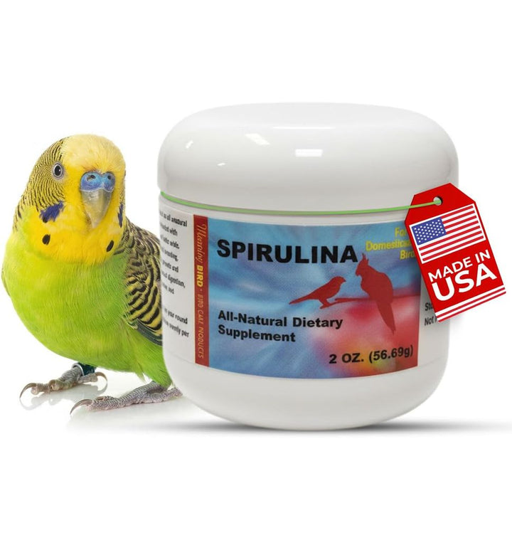 A white plastic jar of Spirulina dietary supplement with a colorful label, shown next to a green and yellow budgerigar on a white background with a red 'Made in USA' tag.