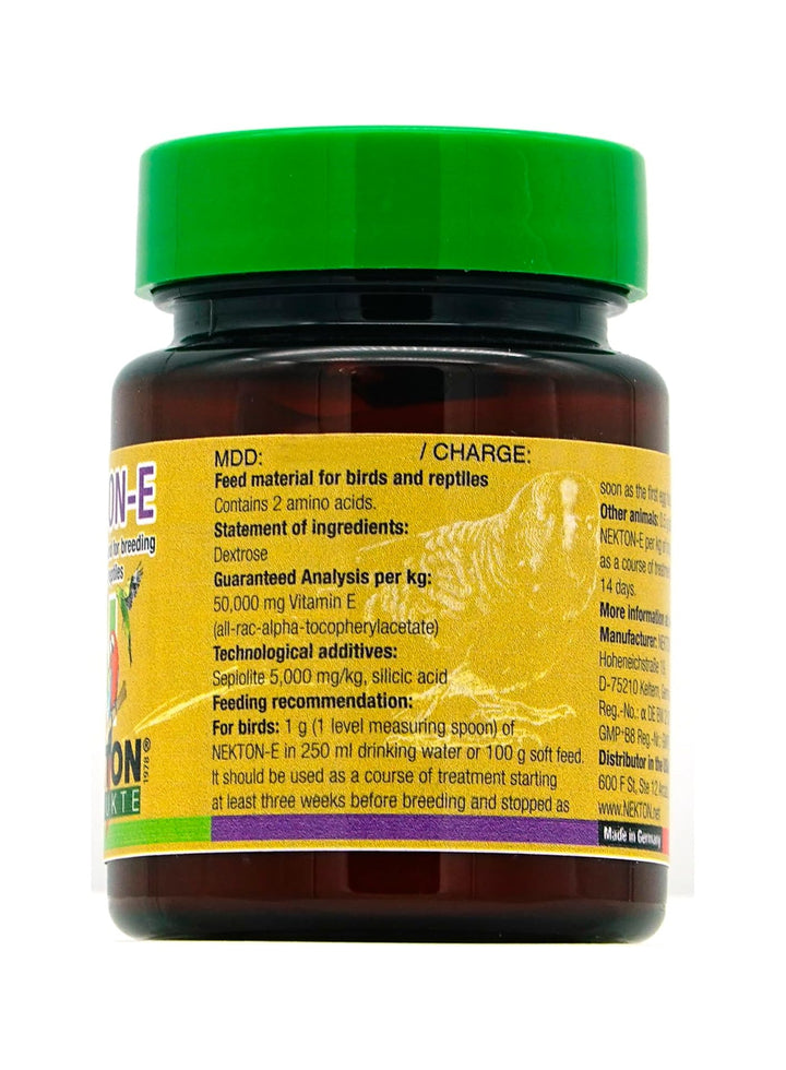 A bottle of Nordon-E Vitamin E for birds and reptiles, featuring a bright green cap and a yellow label with black text, shown against a plain white background.