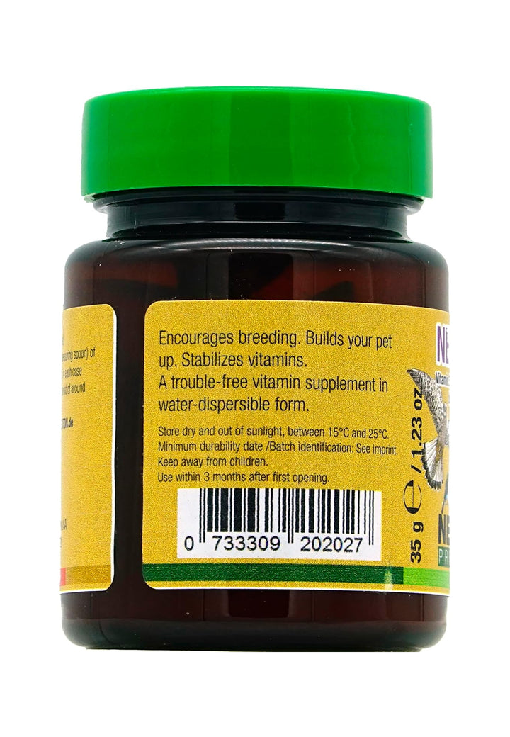 A dark amber brown plastic bottle of pet supplement with a bright green cap and a yellow label, shown against a plain white background.