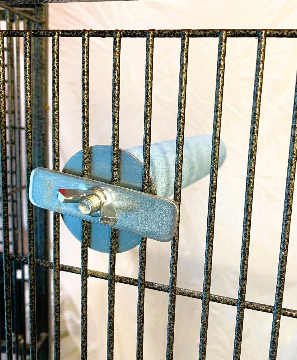 Metallic door handle on a metal gate with a white background