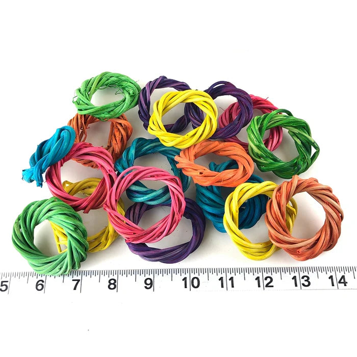 Colorful Super Bird Creations 5 cm Vine Rings - Dyed (100 pack) on a white background with a ruler for scale.