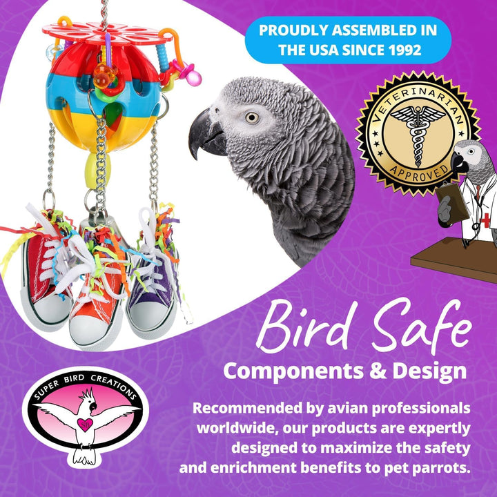 Super Bird Creations Kick Ball Bird toy with colorful components and a parrot on a purple background, featuring text about assembly location and safety.