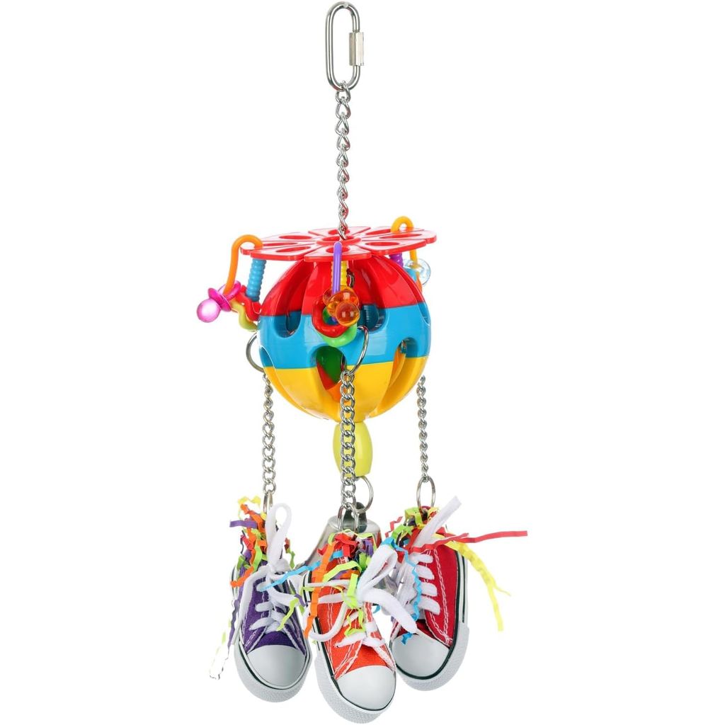 Colorful bird toy (Super Bird Creations Kick Ball) with a chain, hanging from a hook on a white background