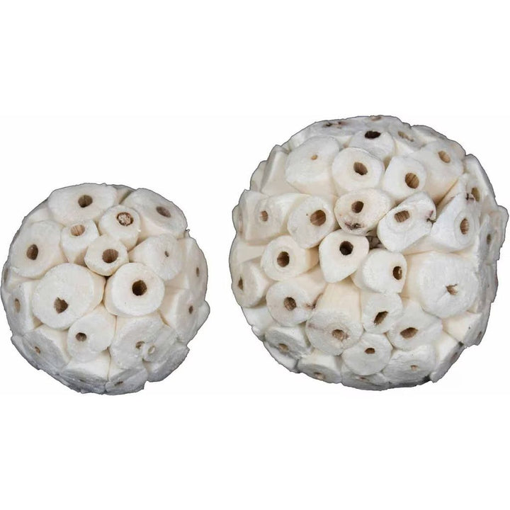 Two spherical objects with a textured surface on a white background
