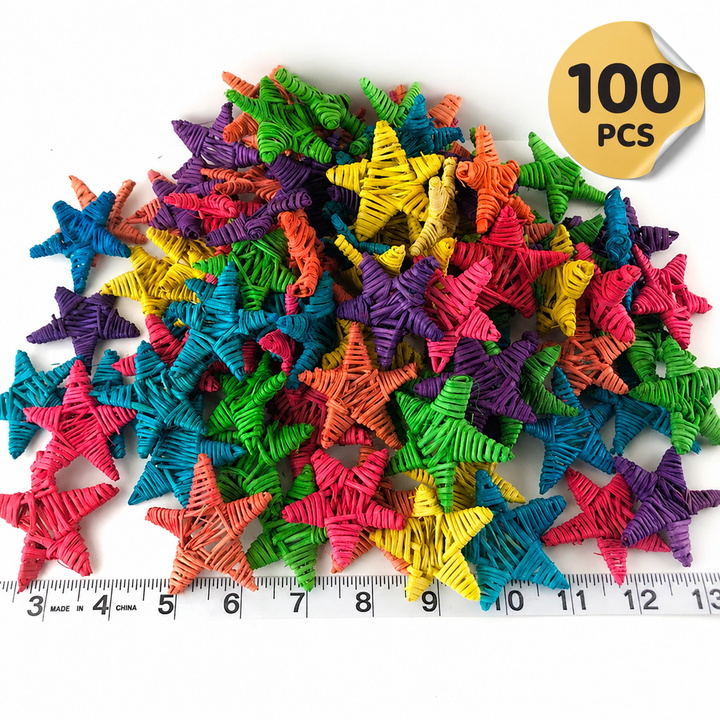 Super Bird Creations Vine Stars Small - Dyed (100): Colorful star-shaped objects with a ruler for scale on a white background