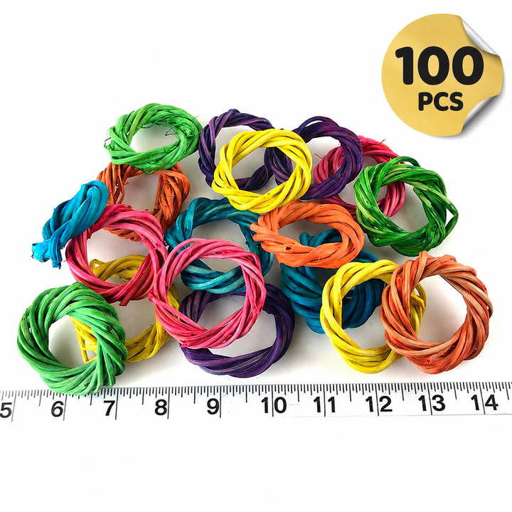 Colorful Super Bird Creations 5 cm Vine Rings - Dyed (100 pack) on a white background with a ruler for scale.