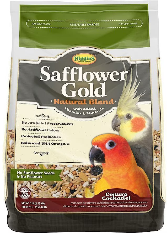 A bag of Higgins Safflower Gold Natural Blend conure cockatiel food, featuring a white and green bag with images of a cockatiel and a lovebird, and visible birdseed pieces on the front.