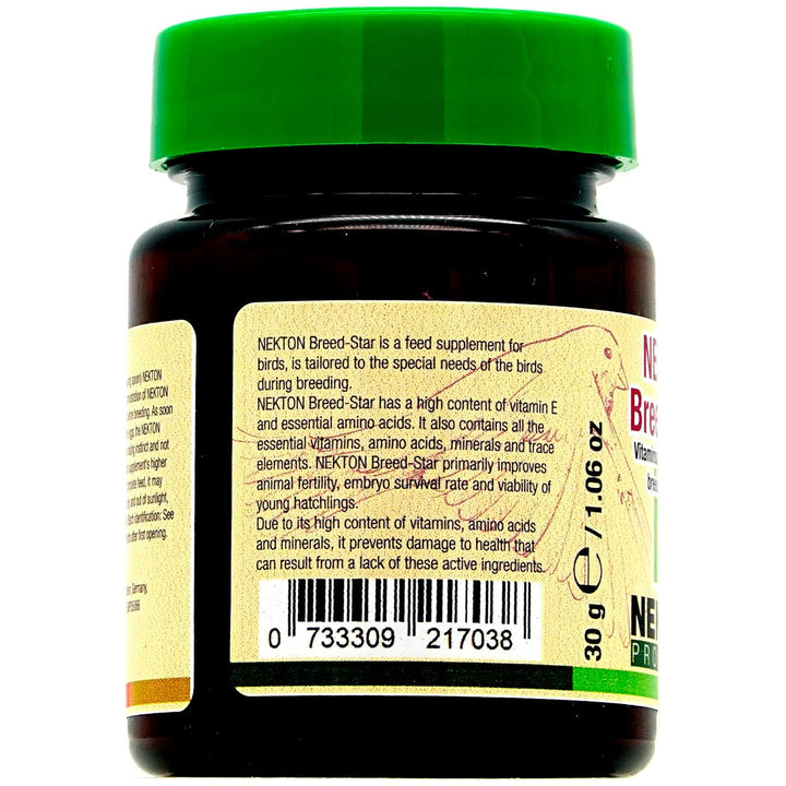 Back view of a dark amber plastic bottle of NEXKT Breed-Star bird supplement with a bright green cap and a beige label showing product details and a barcode.