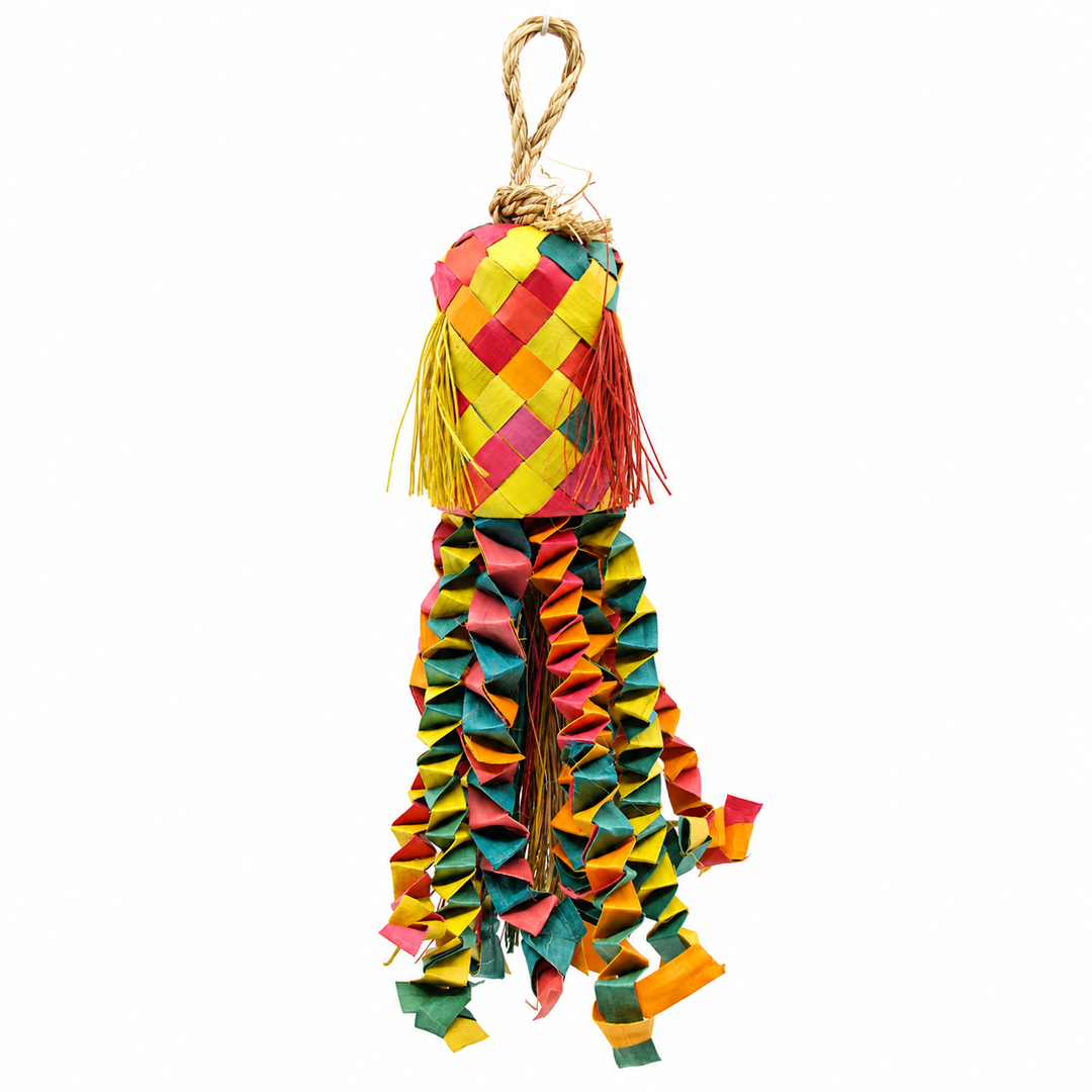 A colorful woven bird toy with a hanging loop, featuring a patterned top section with tassels and a long, wavy, pleated body in yellow, red, green, and orange - Planet Pleasures Octopus Pinata Bird Toy – Small
